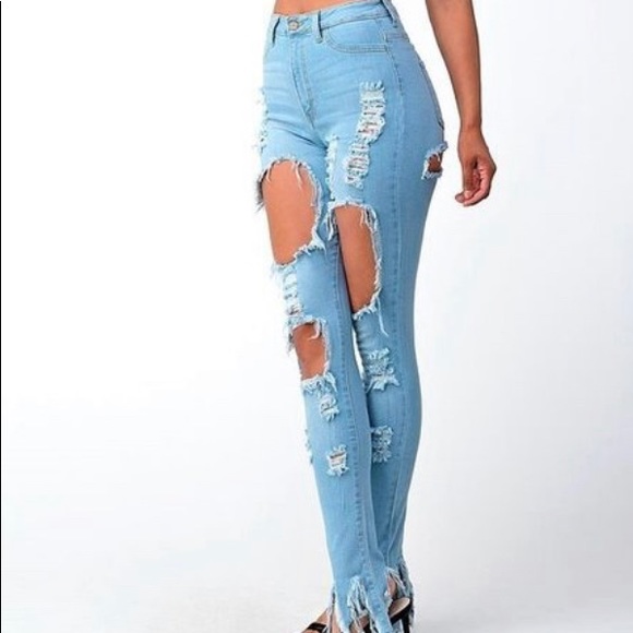Distressed Denim With Ripped Bell Bottoms - Picture 3 of 8
